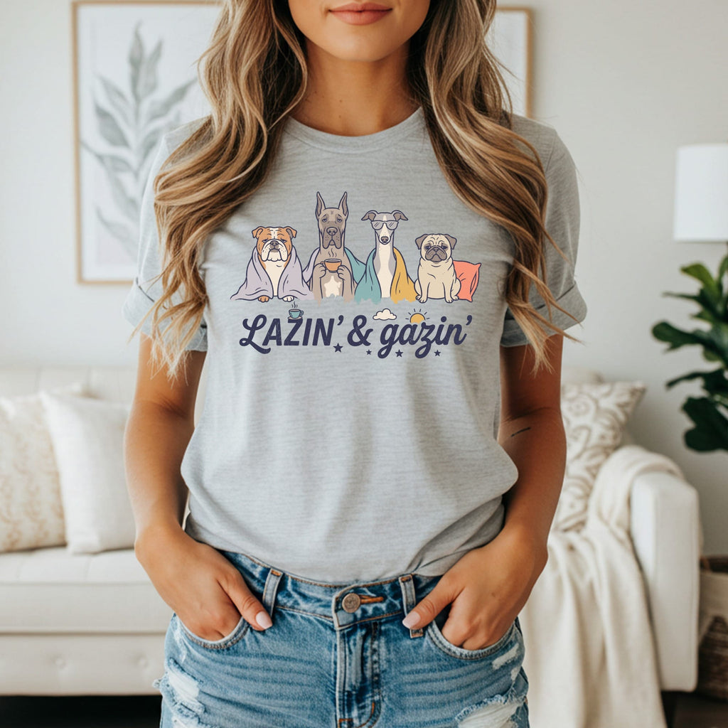Line art of four dogs on a t-shirt with the text "LAZIN' & gazin'".