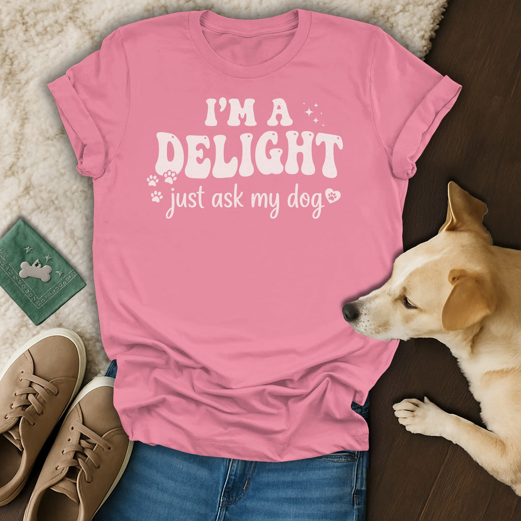 Pink t-shirt with "I'M A DELIGHT just ask my dog" text.