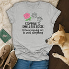 Grey t-shirt with "Stopping to Smell the Roses Because my dog has to smell everything" text.