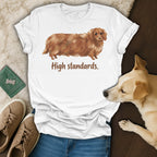 White t-shirt with fluffy brown dachshund and "High standards." text.