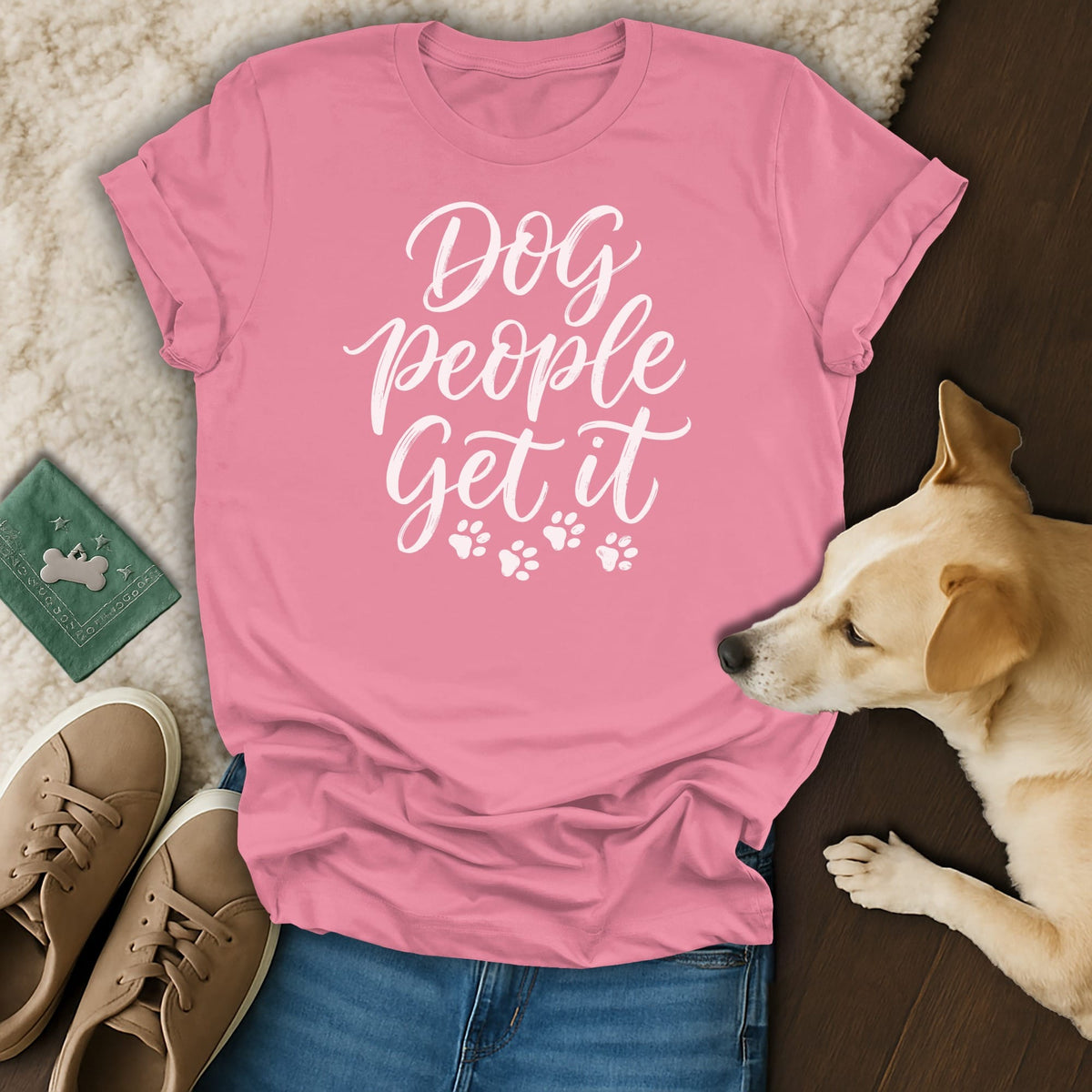 Pink t-shirt with white text "Dog people Get it" and paw prints.