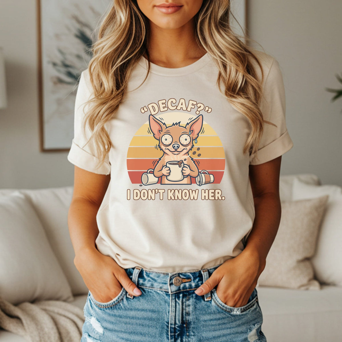 T-shirt graphic: wide-eyed chihuahua holding coffee, text "Decaf?" and "I don't know her."