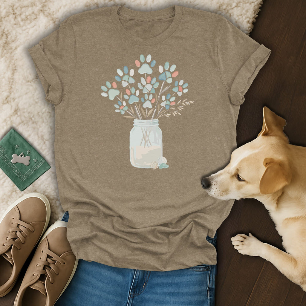 T-shirt with a mason jar bouquet of colorful paw prints and seashells.