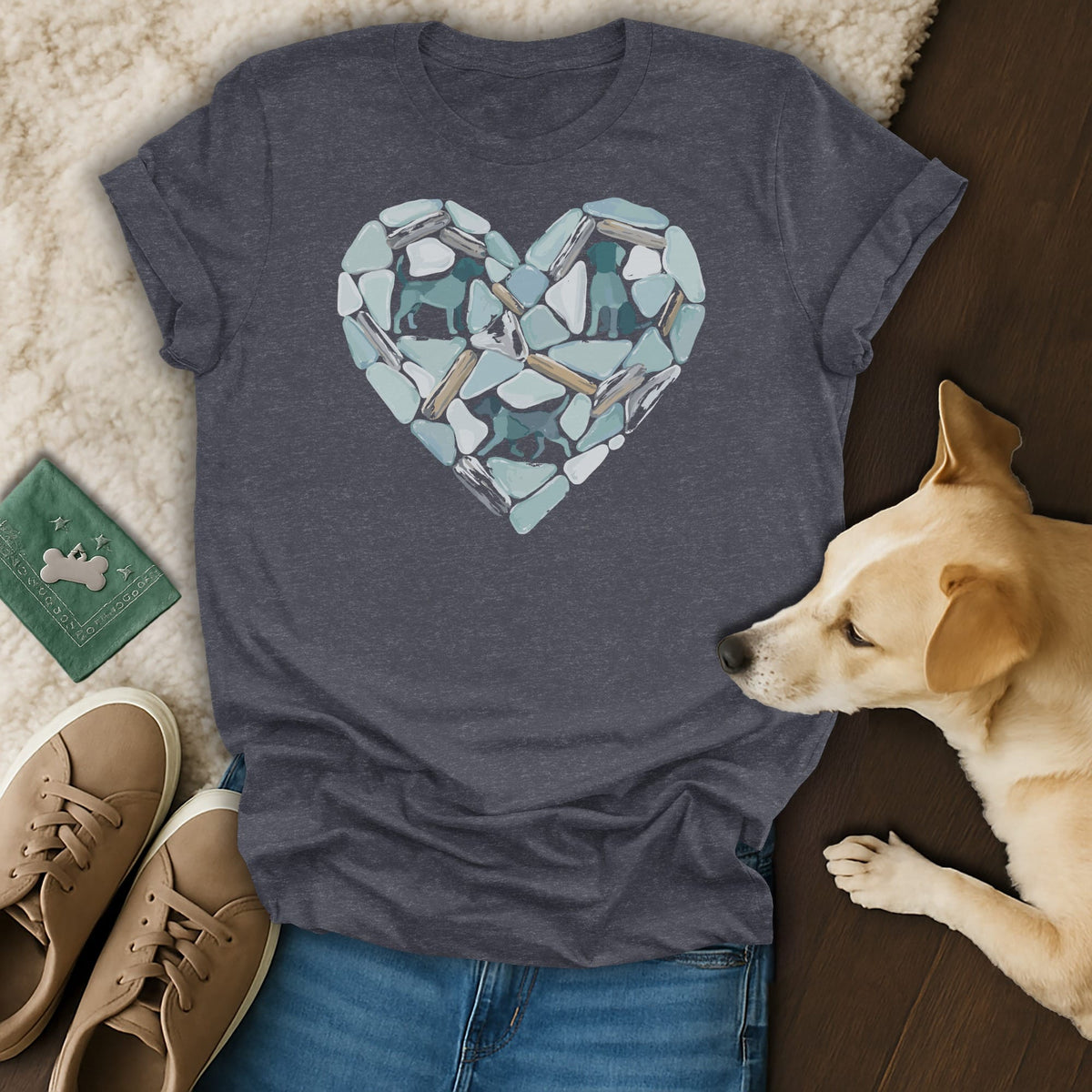 Gray t-shirt with a heart graphic made of sea glass and driftwood, featuring dog silhouettes.