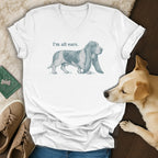 White t-shirt with a blue basset hound graphic and text that reads "I'm all ears."
