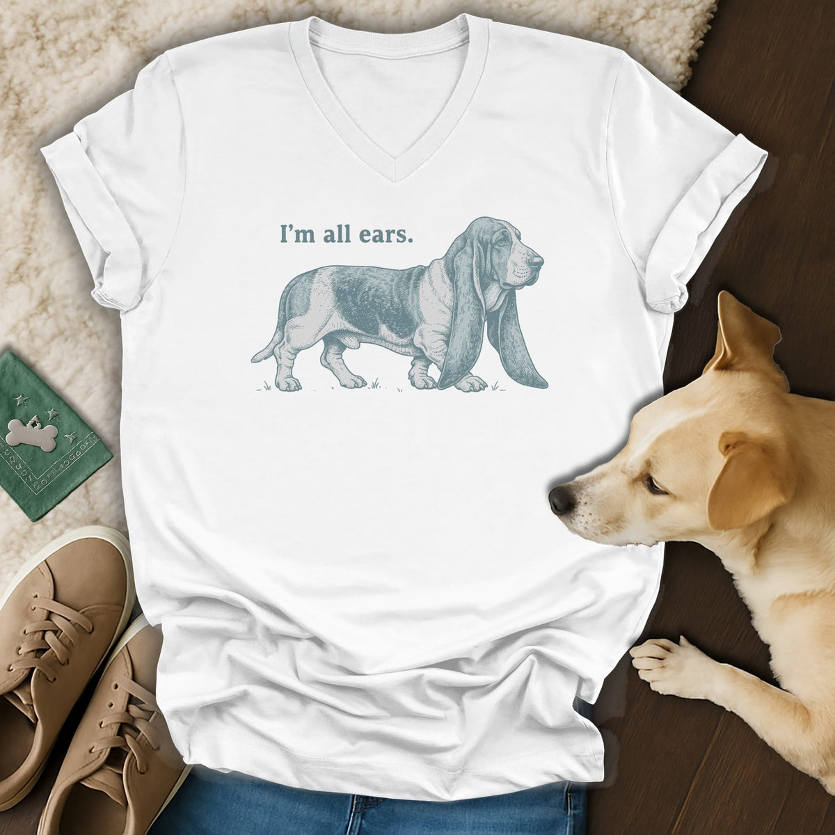 White t-shirt with a blue basset hound graphic and text that reads "I'm all ears."