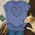 Blue t-shirt with heart made of paw prints and "Bad days are no match for a good dog" text.