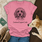 Pink t-shirt with a doodle dog line drawing and text "Emotional Support Curls".