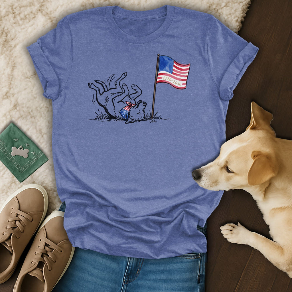 Dog in patriotic bandana rolls near American flag and "1776-2026" text.