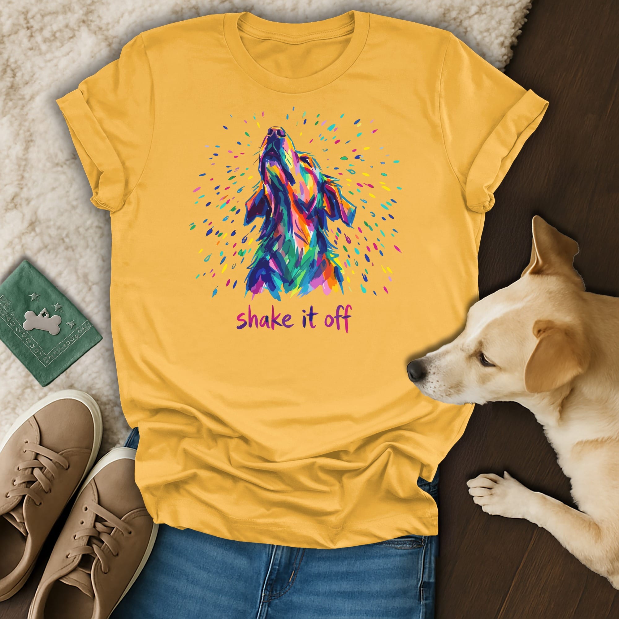 Yellow t-shirt with colorful abstract dog howling and "shake it off" text.