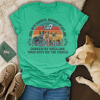 Green t-shirt with three dogs, text reads: "Rode with cowboys. Rounded up outlaws. Currently stealing your spot on the couch."