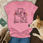 Pink t-shirt with a line drawing of a poodle doing makeup, "Glam-Fur-Us" text.