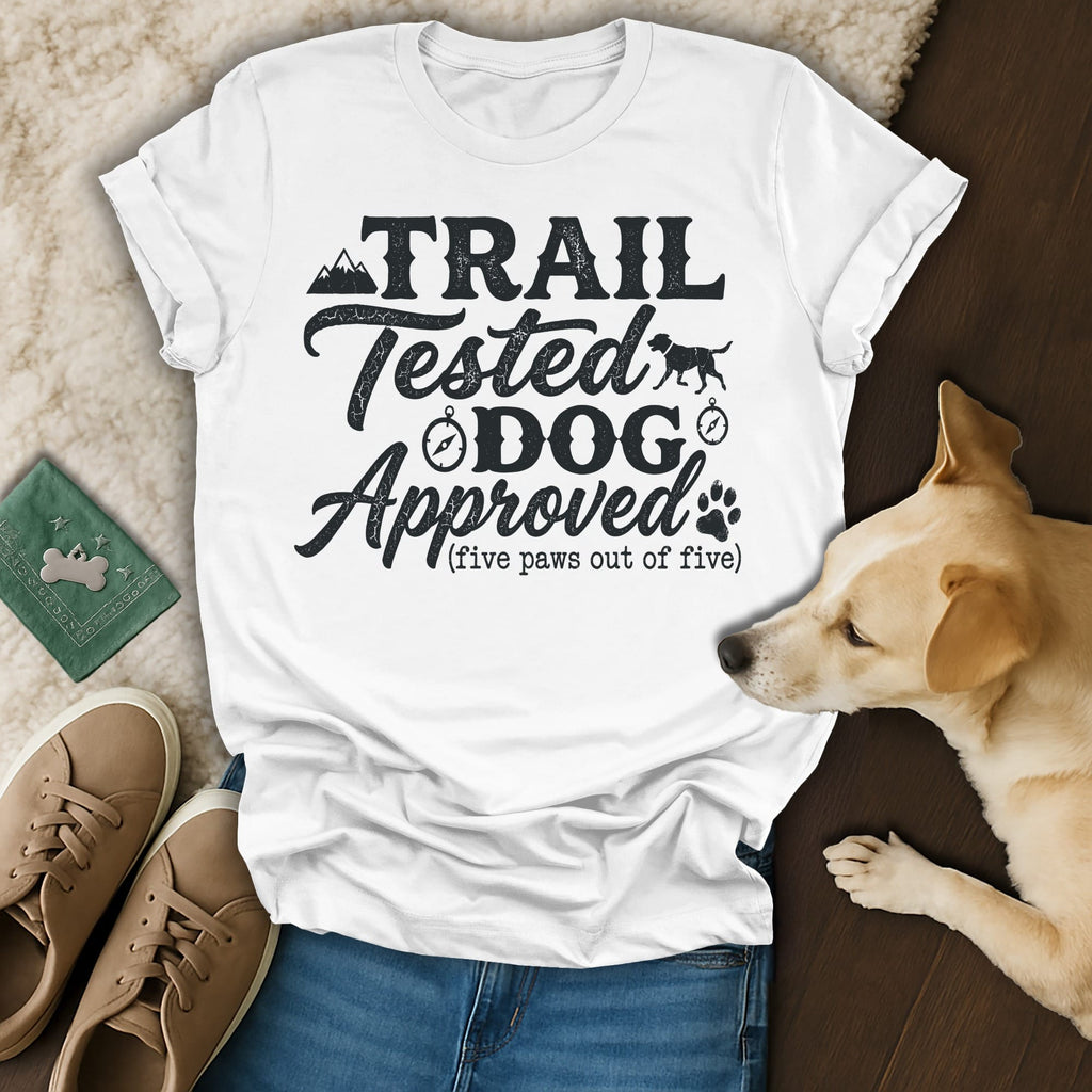 White t-shirt with "Trail Tested Dog Approved" text and dog paw print.
