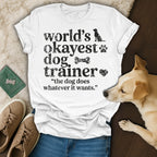 White t-shirt with "World's okayest dog trainer" and a dog graphic.