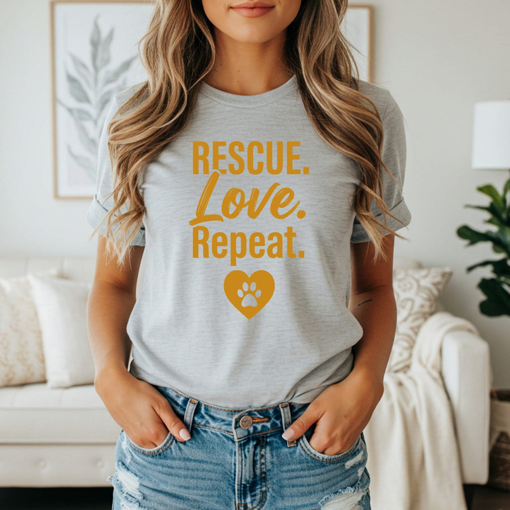 Grey t-shirt with "Rescue. Love. Repeat." and a heart-paw print.