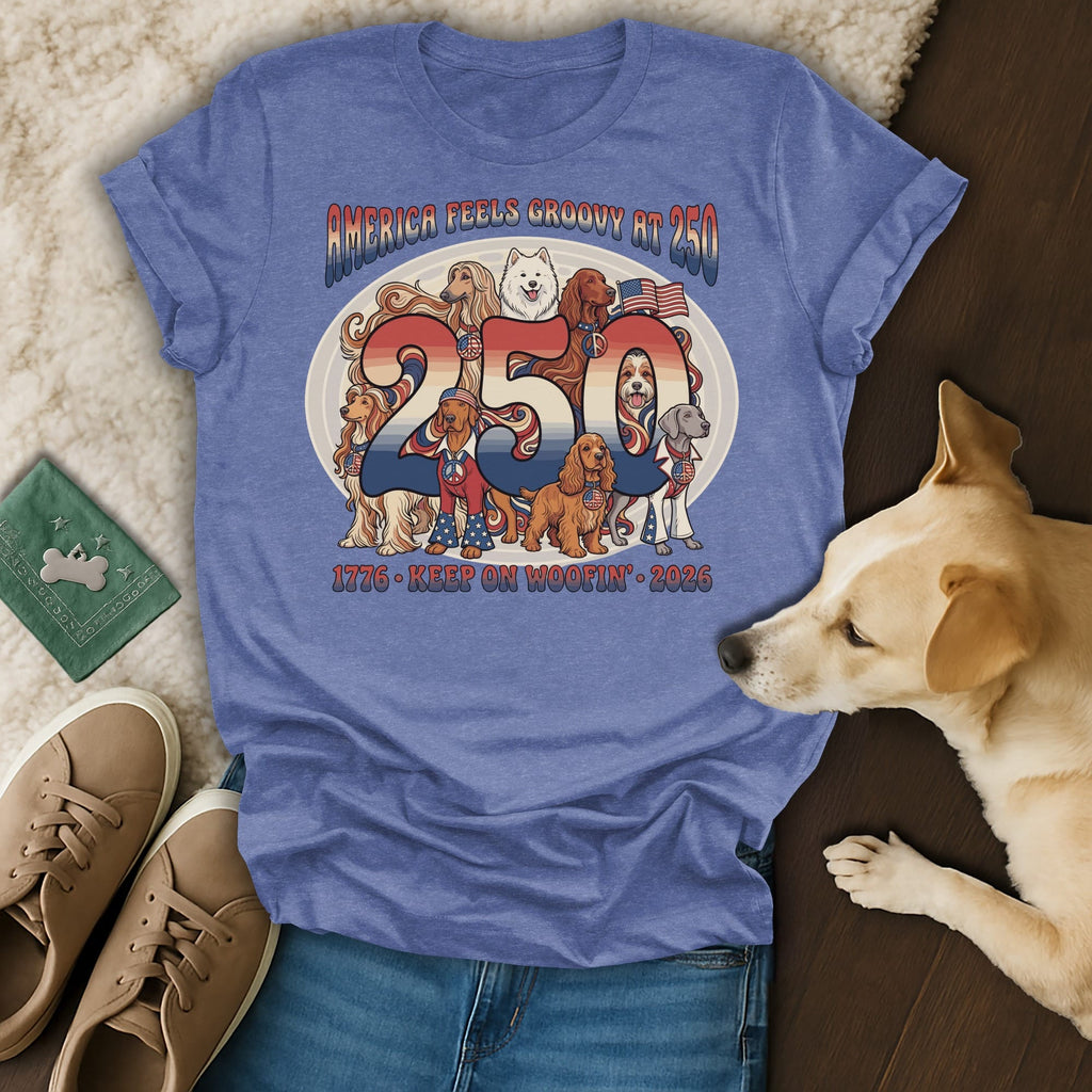 T-shirt with "America Feels Groovy 250" and dogs celebrating 1776-2026.