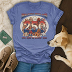 T-shirt with "America Feels Groovy 250" and dogs celebrating 1776-2026.