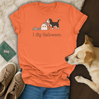 Orange t-shirt with a dog digging up a ghost and "I dig Halloween." text.