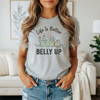 Light grey t-shirt with green dog graphic and text "Life Is Better Belly Up".