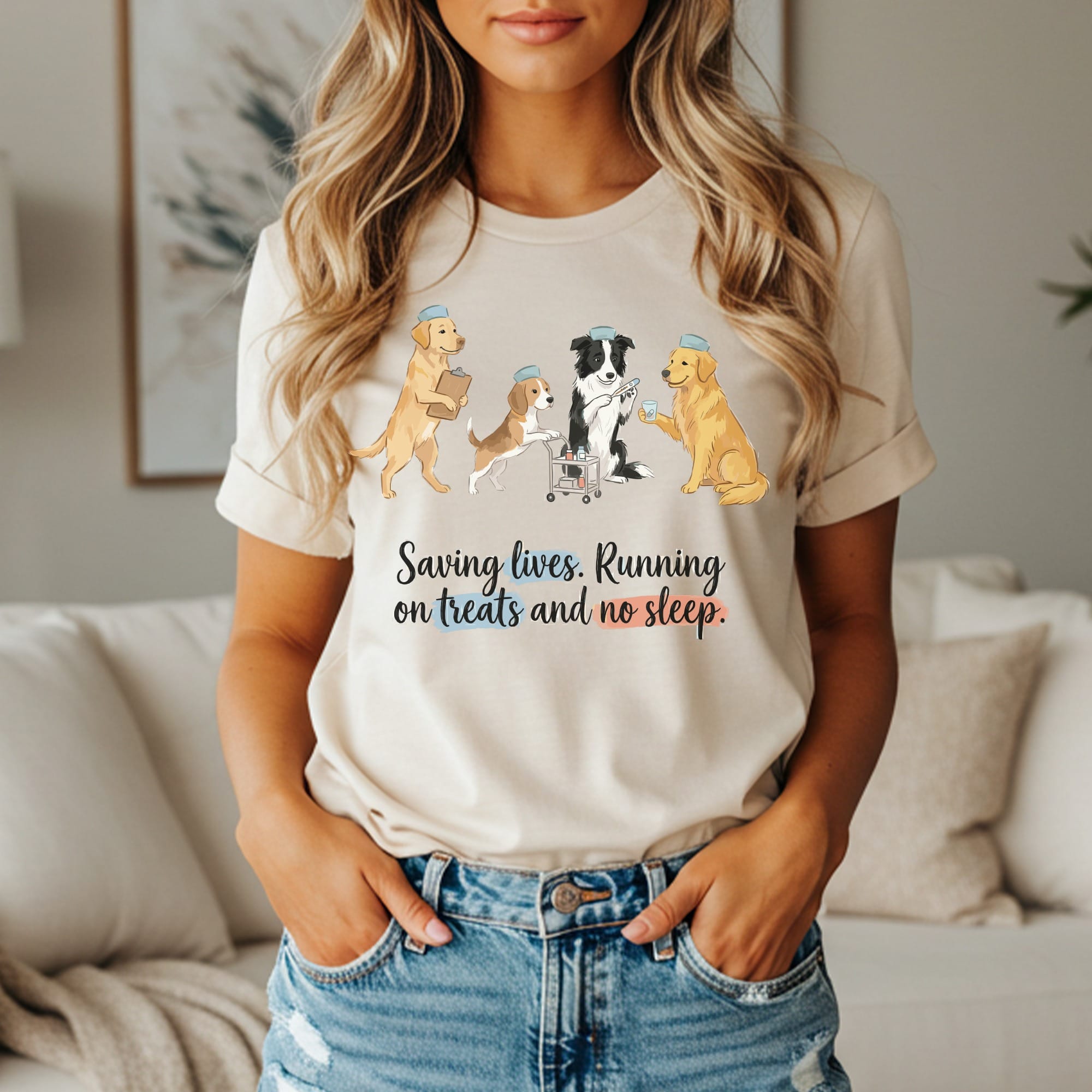 T-shirt with dogs in nurse uniforms and "Saving lives. Running on treats and no sleep." text.
