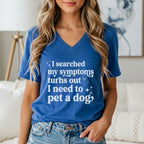 Blue v-neck t-shirt with white text: "I searched my symptoms turns out I need to pet a dog."