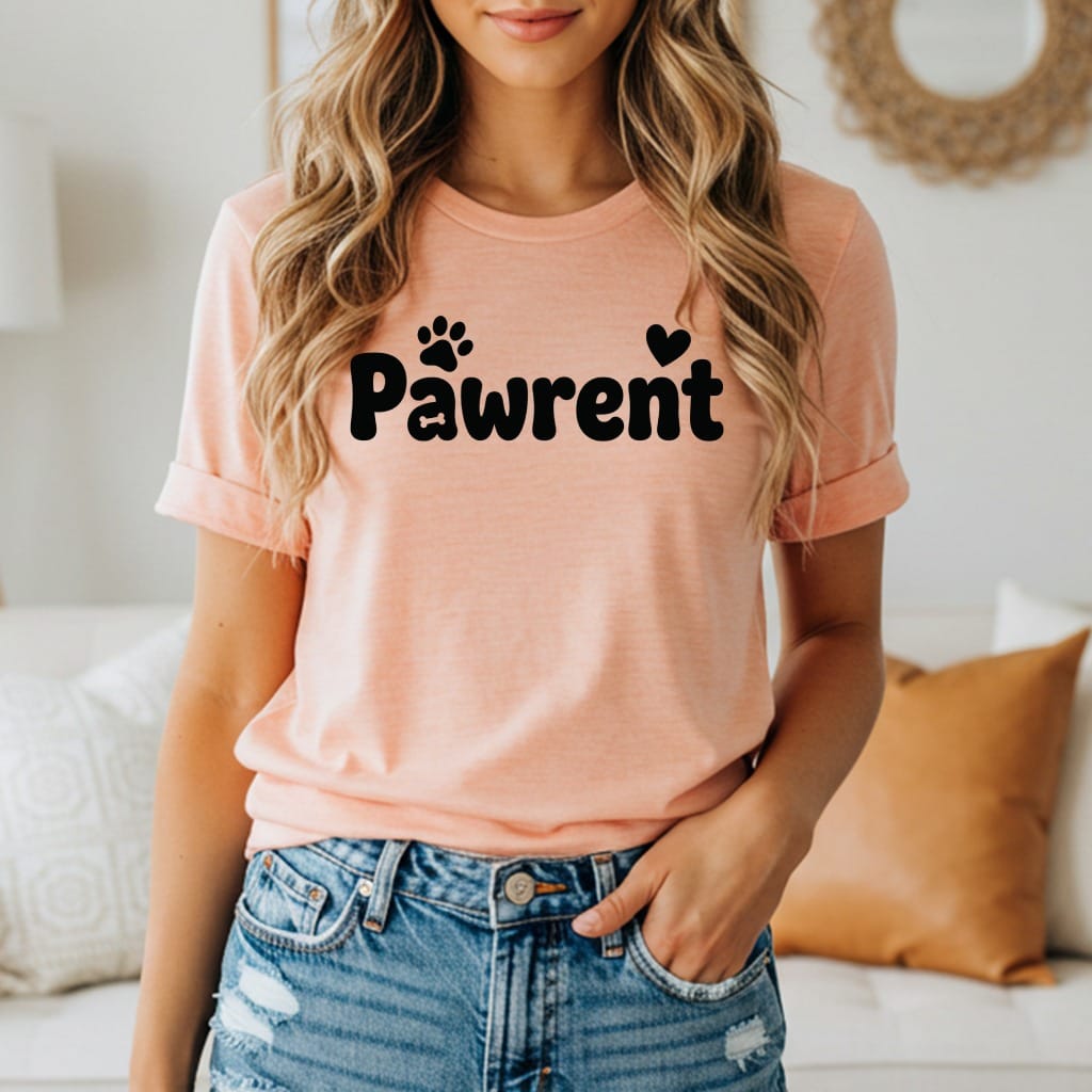 Peach t-shirt with "Pawrent" text and paw print graphic.