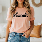 Peach t-shirt with "Pawrent" text and paw print graphic.