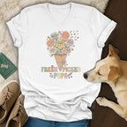 White t-shirt with cartoon puppies as flowers and text "Fresh Picked Pups".