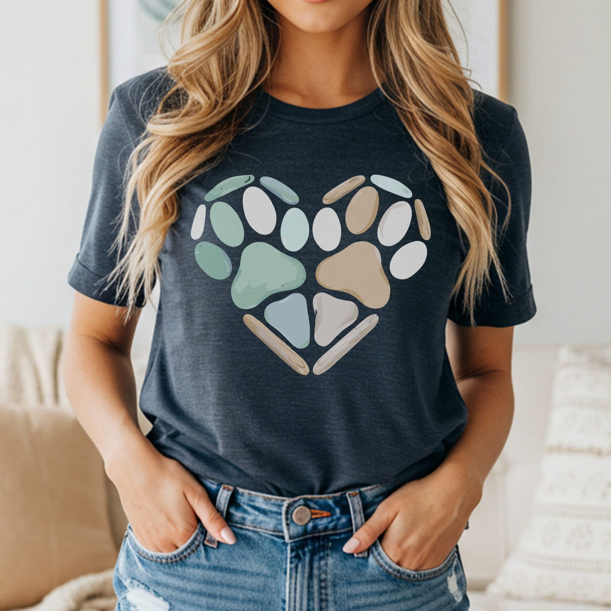 Dark t-shirt with a heart-shaped paw print graphic.
