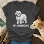 Dark gray t-shirt with a white shaggy dog graphic and text "RUFF AROUND THE EDGES".