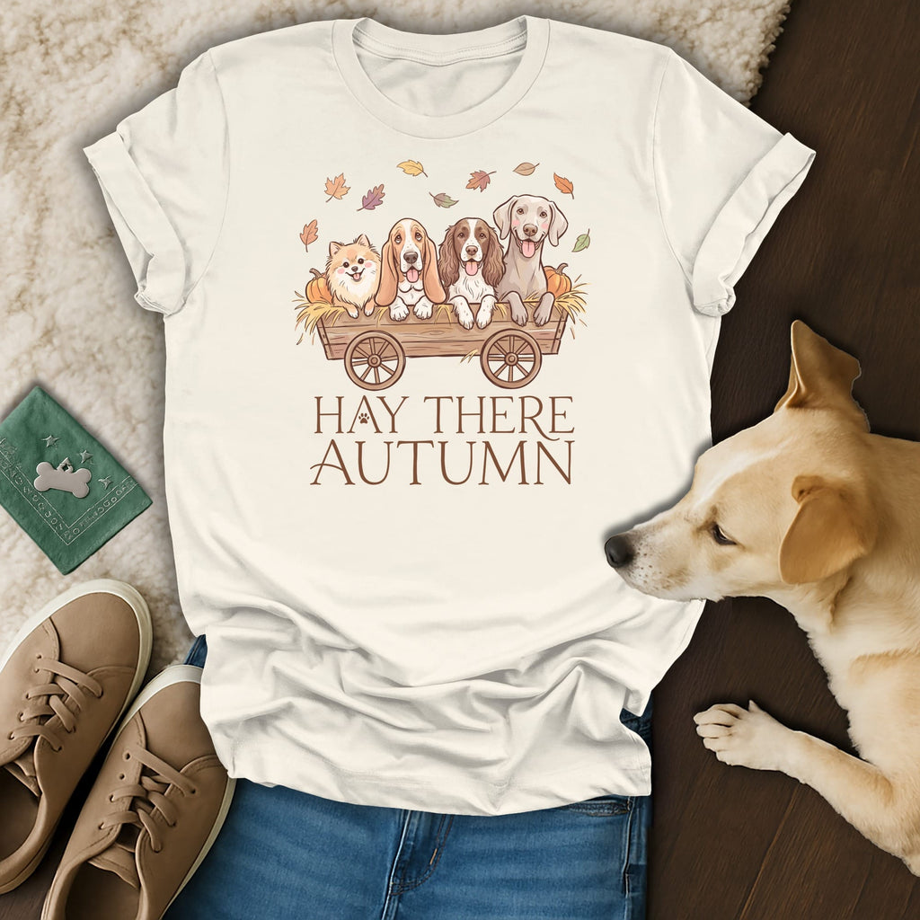 Cream t-shirt with four dogs in a wooden wagon and "Hay There Autumn" text.