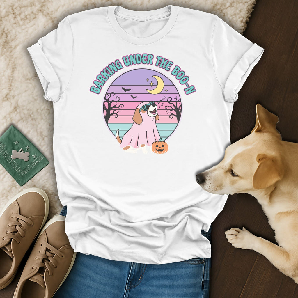 White t-shirt with "Barking Under the Boo-n" graphic featuring a dog in a ghost costume.