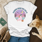 White t-shirt with "Barking Under the Boo-n" graphic featuring a dog in a ghost costume.