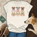 T-shirt with watercolor illustration of three dogs sitting with potted flowers.