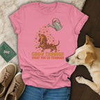 Pink t-shirt featuring a dachshund, flowers, a watering can, and the text Grow Through What You Go Through.