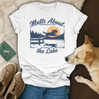 White t-shirt with "Mutts About the Lake" text and a dog jumping into a lake graphic.