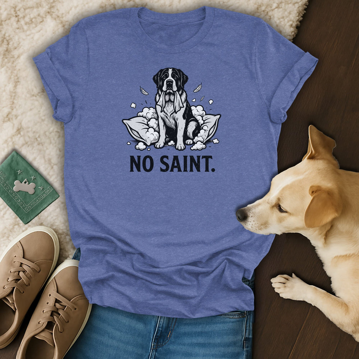 Blue t-shirt with black and white dog graphic and text "NO SAINT."