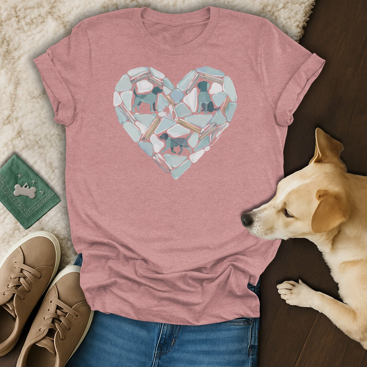 Pink t-shirt with a heart-shaped graphic of dog silhouettes within sea glass pieces.