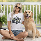 Woman wearing a white t-shirt with a graphic of five dogs wearing beanies.