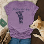 Purple t-shirt with "FlipFlop Won't Stop." and a husky dog graphic.
