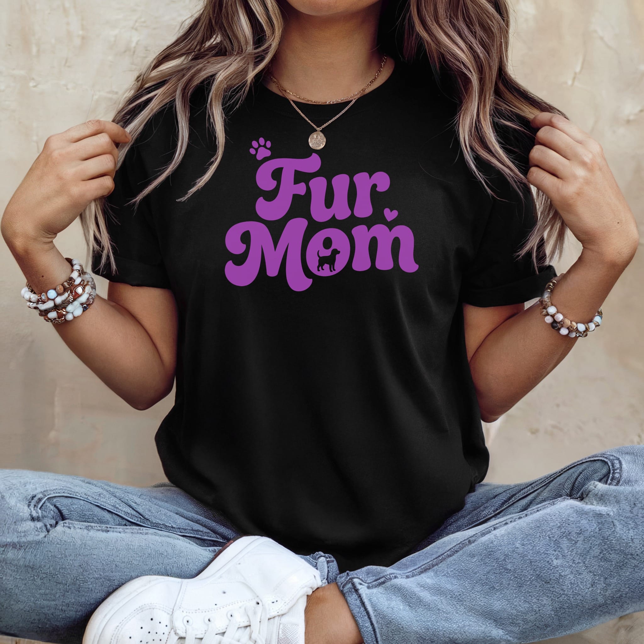 Black t-shirt with "Fur Mom" and a dog silhouette in purple.