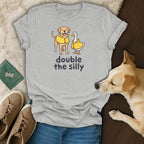 Grey t-shirt with cartoon dog and duck wearing yellow jackets, text "double the silly".