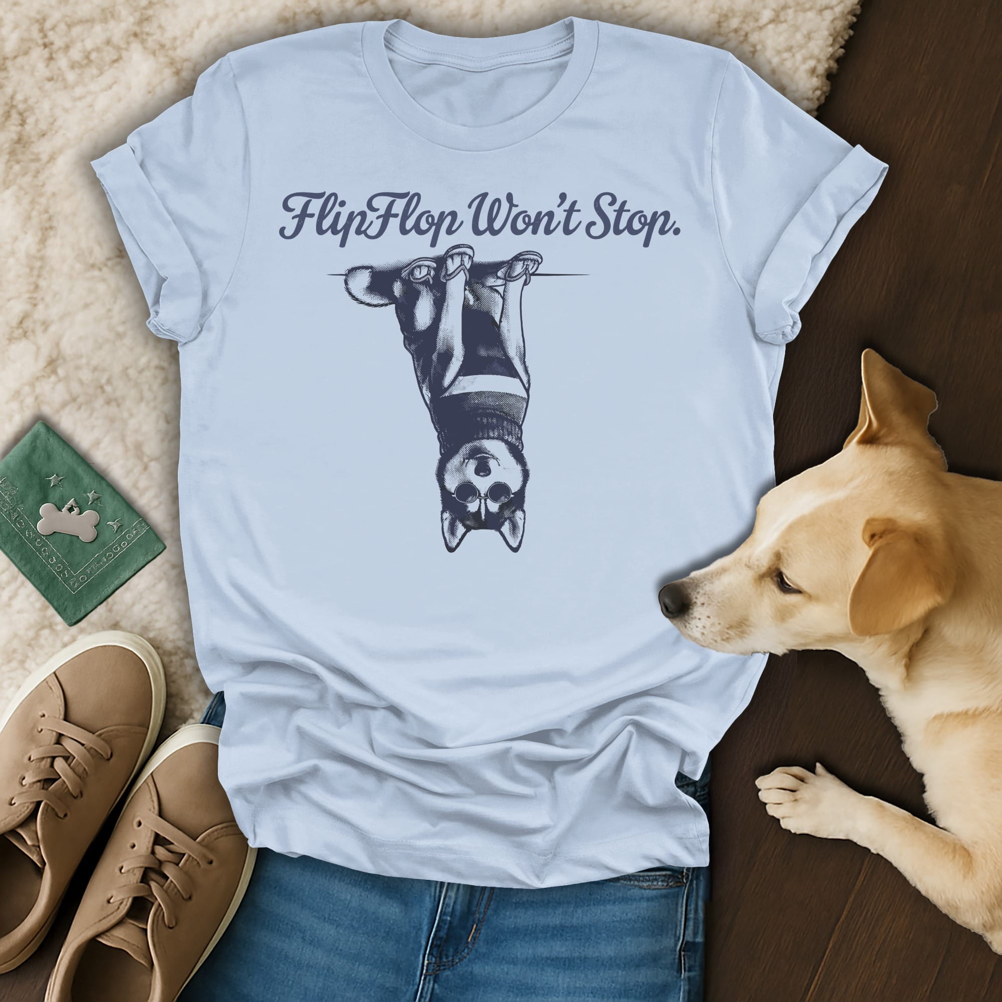 Light blue t-shirt with a husky dog printed upside down saying "FlipFlop Won't Stop."