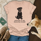 Peach t-shirt with a dog and "Rescued is my favorite breed" text.