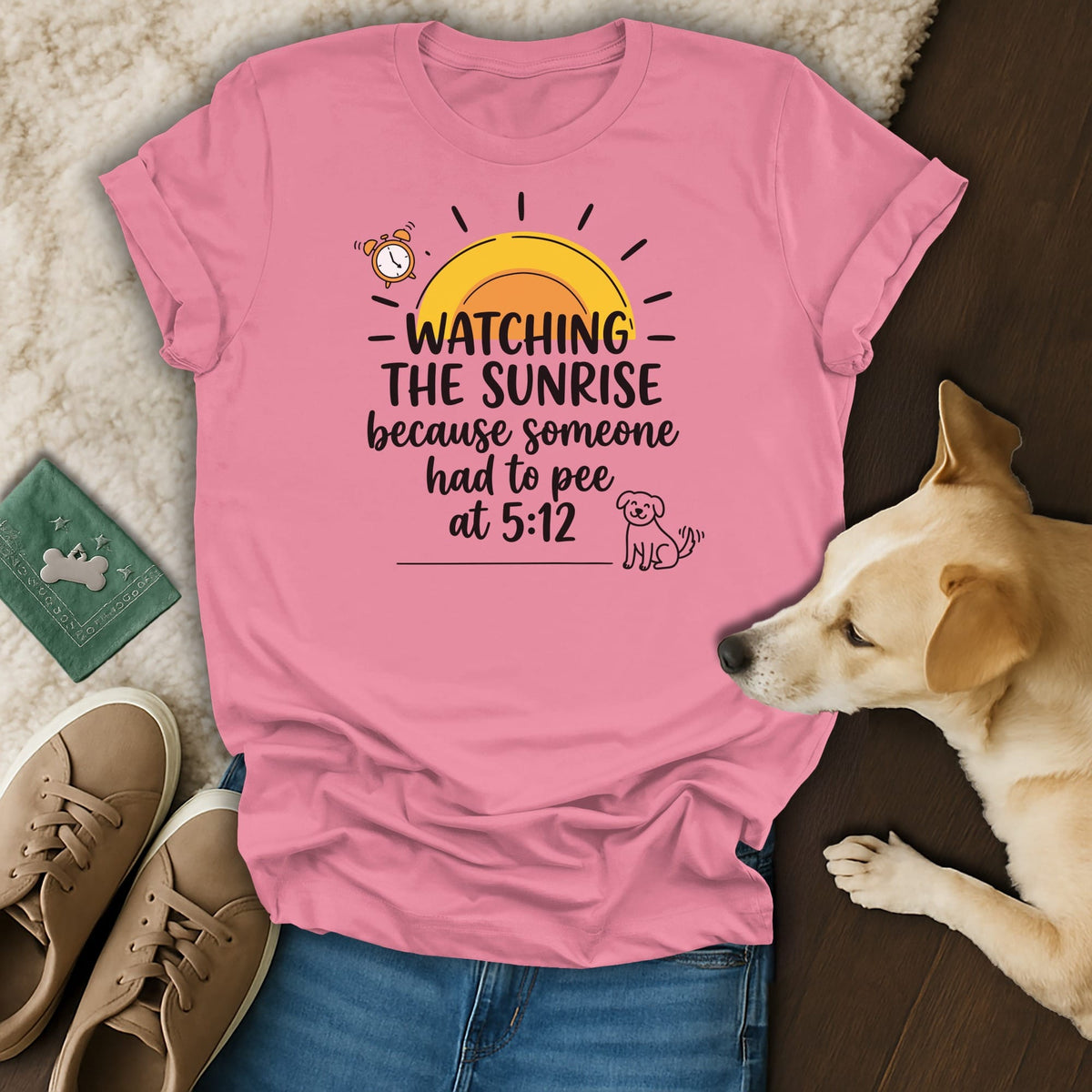 Pink t-shirt with text "Watching the sunrise because someone had to pee at 5:12".