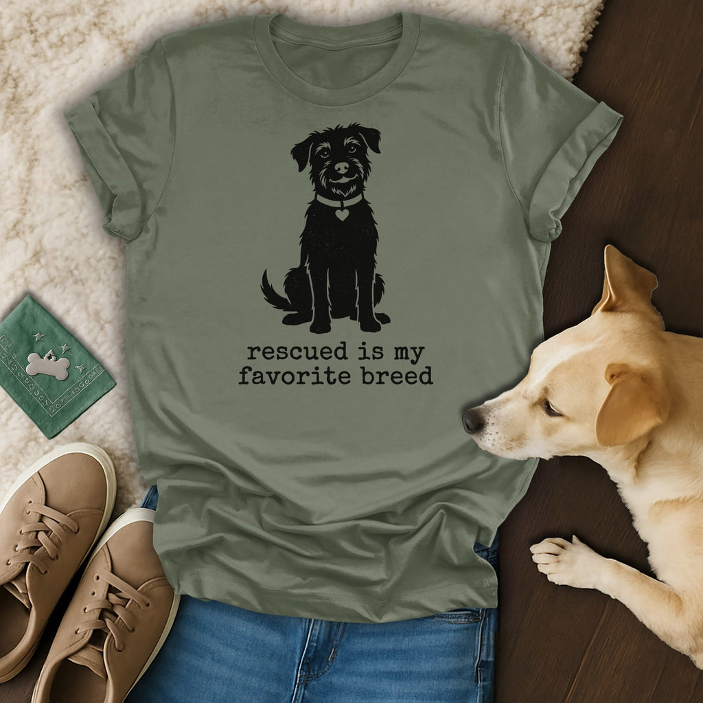 Olive green t-shirt with a black dog silhouette and "Rescued is my favorite breed" text.