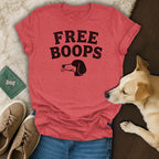 Red t-shirt with "FREE BOOPS" text and a dog graphic.