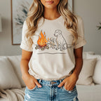 Labrador dog and puppies by a campfire illustration on a cream t-shirt.