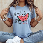 T-shirt graphic of a cute puppy eating a slice of watermelon.