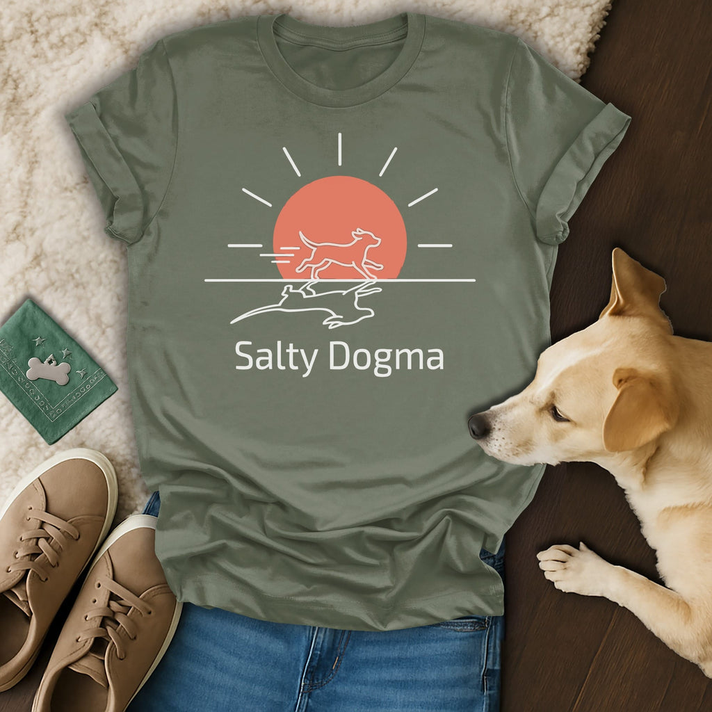 Green t-shirt with a minimalist graphic of a dog running towards a sun.